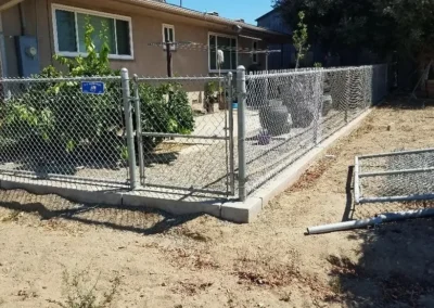 chain link fence around a backyard